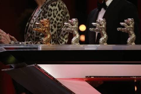 Awards of the Bärenverleihung on a table before the award on stage at the closing ceremony of the Berlinale on 24 02 2018 in Berlin in the Berlinale Palast Awards of the Bärenverleihung on a table before the award on stage at the closing ceremony of the 68 Berlinale on 24 02 2018 in Berlin in the Berlinale Palast