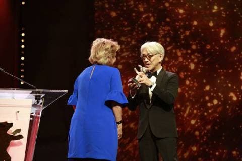 Ana Brun Winner of the Silver Bear for the Best Actress receives the award from the jury member RyÅ «ichi Sakamoto on stage of the closing ceremony of the 68 Berlinale on 24 02 2018 in Berlin at the Berlinale Palast Ana Brun Silver Bear winner for the Best Actress receives the award from the Jury member RyÅ «ichi Sakamoto on the stage of the closing ceremony of the 68 Berlinale on 24 02
