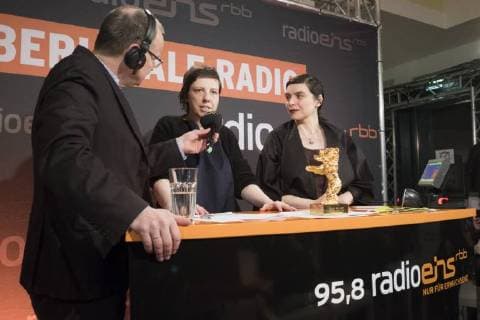 Presenter Knut Elstermann with director Adina Pintilie and producer Bianca Oana Goldener Bär for the best film Touch Me Not at the Berlin Radio Nightlit XXLounge on the occasion of the 68 Berlin International Film Festival 68 Berlin International Film Festival