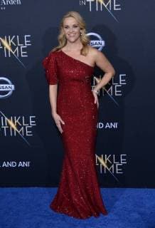 Cast member Reese Witherspoon attends the premiere of the sc-fi motion picture fantasy A Wrinkle in Time at the El Capitan Theatre in the Hollywood section of Los Angeles on February 26, 2018. Storyline: After the disappearance of her scientist father, three peculiar beings send Meg, her brother, and her friend to space in order to find him.  LAP2018022624 JIMxRUYMEN