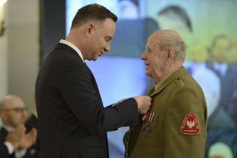 March 1, 2018 - Warsaw, Poland - Presdient Andrzej Duda hands out a state medal to a veteran on the National Day of Remembrance of Cursed Soldiers in Warsaw, Poland on March 1, 2018. Warsaw Poland  - ZUMAn230 20180301_zaa_n230_271 Copyright: xJaapxArriensx