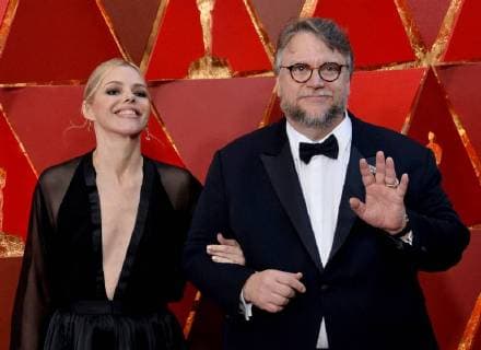 Screenwriter Kim Morgan and film director Guillermo del Toro arrive on the red carpet for the 90th annual Academy Awards at the Dolby Theatre in the Hollywood section of Los Angeles on March 4, 2018.  LAP20180304438 JIMxRUYMEN