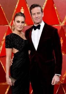 Actors Elizabeth Chambers and Army Hammer arrive on the red carpet for the 90th annual Academy Awards at the Dolby Theatre in the Hollywood section of Los Angeles on March 4, 2018.  LAP20180304878 JIMxRUYMEN