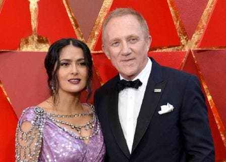 Actor Salma Hayek (L) and François-Henri Pinault arrive on the red carpet for the 90th annual Academy Awards at the Dolby Theatre in the Hollywood section of Los Angeles on March 4, 2018.  LAP20180304454 JIMxRUYMEN