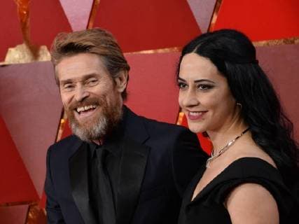 Actor Willem Dafoe (L) and director Giada Colagrande arrive on the red carpet for the 90th annual Academy Awards at the Dolby Theatre in the Hollywood section of Los Angeles on March 4, 2018.  LAP20180304471 JIMxRUYMEN