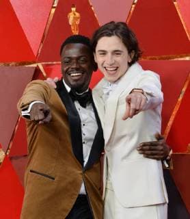Actors Daniel Kaluuya and Timothée Chalamet arrive on the red carpet for the 90th annual Academy Awards at the Dolby Theatre in the Hollywood section of Los Angeles on March 4, 2018.  LAP20180304477 JIMxRUYMEN