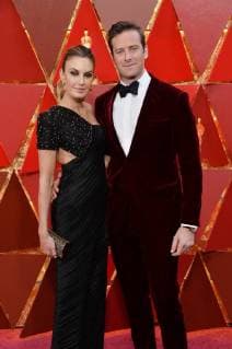 Actors Elizabeth Chambers(L) and Armie Hammer arrive on the red carpet for the 90th annual Academy Awards at the Dolby Theatre in the Hollywood section of Los Angeles on March 4, 2018.  LAP20180304490 JIMxRUYMEN