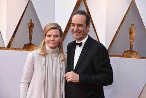 March 4, 2018 - Los Angeles, California, U.S. - DOMINIQUE LEMONNIER AND ALEXANDRE DESPLAT arrive on the red carpet for the 90th Annual Academy Awards at the Dolby Theatre. Los Angeles U.S. - ZUMAz03_ 20180304_zbp_z03_056 Copyright: xKevinxSullivanx