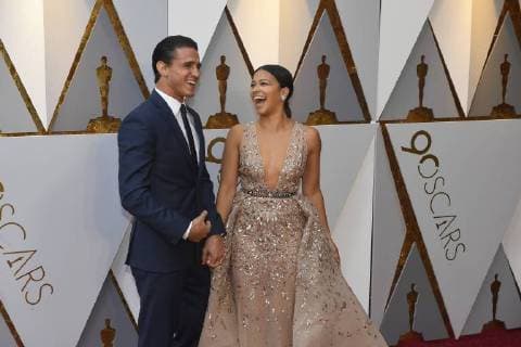March 4, 2018 - Los Angeles, California, U.S. - JOE LoCICERO AND GINA RODRIGUEZ arrives on the red carpet for the 90th Annual Academy Awards at the Dolby Theatre. Los Angeles U.S. - ZUMAz03_ 20180304_zbp_z03_066 Copyright: xKevinxSullivanx
