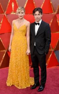Director Greta Gerwig (L) and Noah Baumbach arrive on the red carpet for the 90th annual Academy Awards at the Dolby Theatre in the Hollywood section of Los Angeles on March 4, 2018.  LAP20180304946 JIMxRUYMEN
