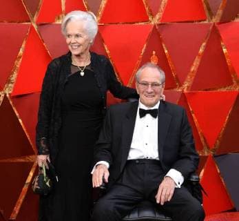 Cinematographer Owen Roizman and guest arrive on the red carpet for the 90th annual Academy Awards at the Dolby Theatre in the Hollywood section of Los Angeles on March 4, 2018.  LAP20180304510 JIMxRUYMEN