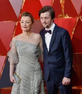 Actor Lesley Manville (L) and guest arrive on the red carpet for the 90th annual Academy Awards at the Dolby Theatre in the Hollywood section of Los Angeles on March 4, 2018.  LAP20180304956 JIMxRUYMEN