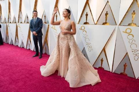 Gina Rodriguez arrives with guest on the red carpet of The 90th OscarsÂ® at the DolbyÂ® Theatre in Hollywood, CA on Sunday, March 4, 2018.  Copyright: xPhilxMcCartenx 33546_322PLX