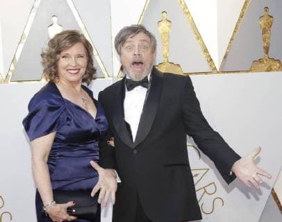 Mark Hamil (R) and Marilou York arrive on the red carpet for the 90th annual Academy Awards at the Dolby Theatre in the Hollywood section of Los Angeles on March 4, 2018.  LAP20180304209 JOHNxANGELILLO