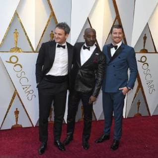 March 4, 2018 - Los Angeles, California, U.S. - JASON CLARKE, ROB MORGAN and GARRETT HEDLUND arrive on the red carpet for the 90th Annual Academy Awards at the Dolby Theatre. Los Angeles U.S. - ZUMAz03_ 20180304_zbp_z03_100 Copyright: xKevinxSullivanx