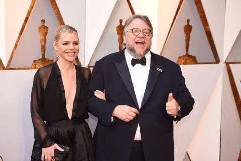 March 4, 2018 - Los Angeles, California, U.S. - GUILLERMO DEL TORO who arrives with Screenwriter KIM MORGAN on the red carpet for the 90th Annual Academy Awards at the Dolby Theatre. Del Toro, won a Best Director Oscar for The Shape of Water. Los Angeles U.S. - ZUMAz03_ 20180304_zbp_z03_151 Copyright: xKevinxSullivanx