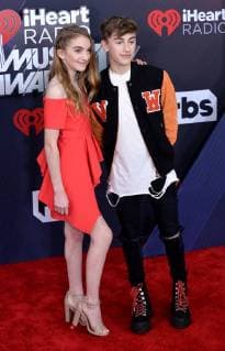(L-R) Lauren Orlando and Johnny Orlando arrive for the iHeartRadio Music Awards at The Forum in Inglewood, California on March 11, 2018. Turner s TBS, TNT, and truTV channels broadcasted the ceremony live from The Forum.  LAP20180311016 JIMxRUYMEN