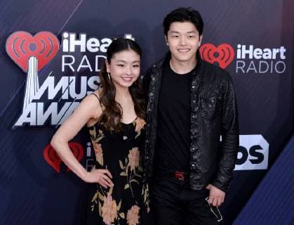 Ice dancers Maia Shibutani (L) and Alex Shibutani arrive for the iHeartRadio Music Awards at The Forum in Inglewood, California on March 11, 2018. Turner s TBS, TNT, and truTV channels broadcasted the ceremony live from The Forum.  LAP20180311030 JIMxRUYMEN