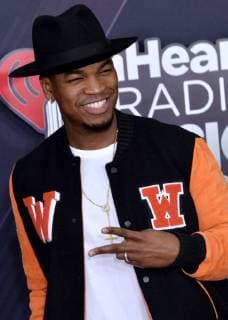 Singer Ne-Yo arrives for the iHeartRadio Music Awards at The Forum in Inglewood, California on March 11, 2018. Turner s TBS, TNT, and truTV channels broadcasted the ceremony live from The Forum.  LAP20180311038 JIMxRUYMEN