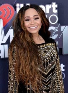 Singer Evvie McKinney arrives for the iHeartRadio Music Awards at The Forum in Inglewood, California on March 11, 2018. Turner s TBS, TNT, and truTV channels broadcasted the ceremony live from The Forum.  LAP20180311049 JIMxRUYMEN