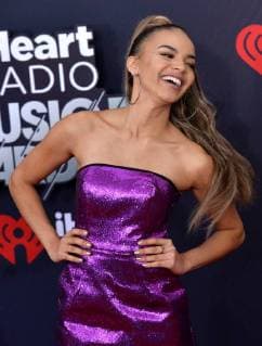 Singer Leslie Grace arrives for the iHeartRadio Music Awards at The Forum in Inglewood, California on March 11, 2018. Turner s TBS, TNT, and truTV channels broadcasted the ceremony live from The Forum.  LAP20180311062 JIMxRUYMEN