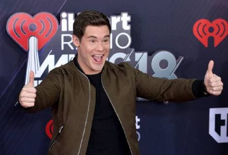 Actor Adam DeVine arrives for the iHeartRadio Music Awards at The Forum in Inglewood, California on March 11, 2018. Turner s TBS, TNT, and truTV channels broadcasted the ceremony live from The Forum.  LAP20180311132 JIMxRUYMEN