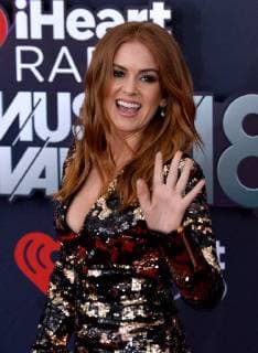 Actress Isla Fisher arrives for the iHeartRadio Music Awards at The Forum in Inglewood, California on March 11, 2018. Turner s TBS, TNT, and truTV channels broadcasted the ceremony live from The Forum.  LAP20180311151 JIMxRUYMEN