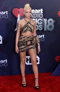 Singer Halsey arrives for the iHeartRadio Music Awards at The Forum in Inglewood, California on March 11, 2018. Turner s TBS, TNT, and truTV channels broadcasted the ceremony live from The Forum.  LAP20180311164 JIMxRUYMEN
