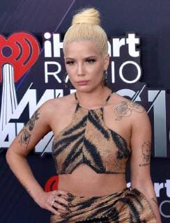 Singer Halsey arrives for the iHeartRadio Music Awards at The Forum in Inglewood, California on March 11, 2018. Turner s TBS, TNT, and truTV channels broadcasted the ceremony live from The Forum.  LAP20180311166 JIMxRUYMEN
