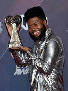 Khalid, winner of the R&B Artist of the Year and Best New R&B Artist awards, appears backstage during the iHeartRadio Music Awards at The Forum in Inglewood, California on March 11, 2018. Turner s TBS, TNT, and truTV channels broadcasted the ceremony live from The Forum.  LAP20180311222 JIMxRUYMEN