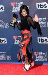 Singer Camila Cabello, winner of the Fangirls Award, appears backstage during the iHeartRadio Music Awards at The Forum in Inglewood, California on March 11, 2018. Turner s TBS, TNT, and truTV channels broadcasted the ceremony live from The Forum.  LAP20180311250 JIMxRUYMEN