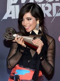 Singer Camila Cabello, winner of the Fangirls Award, appears backstage during the iHeartRadio Music Awards at The Forum in Inglewood, California on March 11, 2018. Turner s TBS, TNT, and truTV channels broadcasted the ceremony live from The Forum.  LAP20180311252 JIMxRUYMEN