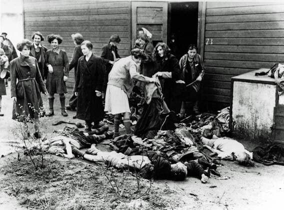 KZ Bergen Belsen Liberated women who get the clothes of the dead after the camp was handed over to the Allied 21st Army Group 55 000 prisoners were found in the camp Many with typhoid and dysentery More than 10 000 former prisoners died after the liberation Germany Date 15 April 1945