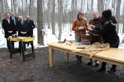German Community Minister President Oliver Paasch, a security guard, Walloon Minister President Willy Borsus, Federation Wallonia - Brussels Minister President Rudy Demotte, Queen Mathilde of Belgium and King Philippe - Filip of Belgium pictured during a visit to a sugar shack on the first day of a state visit of the Belgian Royals to Canada in Ottawa, Canada, Monday 12 March 2018.  BENOITxDOPPAGNE 05311931