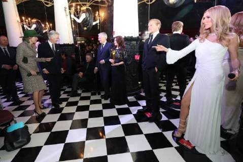 Queen Mathilde of Belgium (L) and King Philippe - Filip of Belgium (2L) react as Vice-Prime Minister and Foreign Minister Didier Reynders (C) pretends to be a statue during a visit to the Grevin Wax Museum on the fifth day of a state visit of the Belgian Royals to Canada in Montreal, Canada, Friday 16 March 2018.  BENOITxDOPPAGNE 05314493