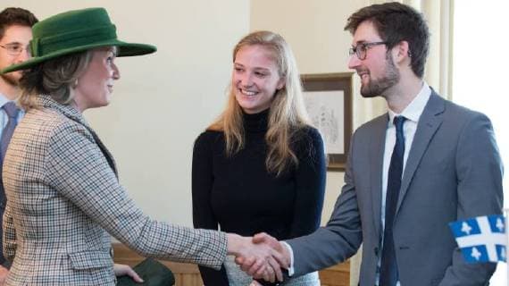 Queen Mathilde of Belgium (L) talks to Belgian Princess Louisa Maria (C), who is a student in Montreal, during a meeting with Belgian and Canadian students at Faculty club of McGill University on the fifth day of a state visit of the Belgian Royals to Canada in Montreal, Canada, Friday 16 March 2018.  BENOITxDOPPAGNE 05314511