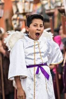 March 18, 2018 - San Miguel De Allende, Guanajuato, Mexico - A young boy dressed as an angel yawns during the early morning Our Lord of the Column procession marking the start of Holy Week March 18, 2018 in San Miguel de Allende, Mexico. The midnight procession involves a life-sized figure of Christ carried eight miles from Atotonilco to San Miguel on the shoulders of the faithful. Holy week lasts two weeks in the festival central Mexican town. San Miguel De Allende Mexico - ZUMAe02_ 20180318_zaf_e02_012 Copyright: xRichardxEllisx