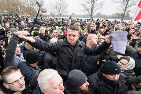 March 18, 2018 - London, London, UK - London , UK . TOMMY ROBINSON (centre) delivers his speech to the crowd . 1000s including supporters of alt-right groups such as Generation Identity and the Football Lads Alliance , at Speakers Corner in Hyde Park where Tommy Robinson reads a speech by Generation Identity campaigner Martin Sellner . Along with Brittany Pettibone , Sellner was due to deliver the speech last week but the pair were arrested and detained by police when they arrived in the UK , forcing them to cancel an appearance at a UKIP Young Independence youth event , which in turn was reportedly cancelled amid security concerns London UK  - ZUMAl94_ 20180318_zaf_l94_091 Copyright: xJoelxGoodmanx