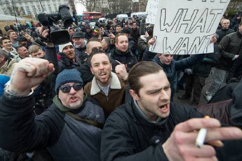 March 18, 2018 - London, London, UK - London , UK . Supporters of Tommy Robinson and Martin Sellner celebrate the speech going ahead after Tommy Robinson leaves . 1000s including supporters of alt-right groups such as Generation Identity and the Football Lads Alliance , at Speakers Corner in Hyde Park where Tommy Robinson reads a speech by Generation Identity campaigner Martin Sellner . Along with Brittany Pettibone , Sellner was due to deliver the speech last week but the pair were arrested and detained by police when they arrived in the UK , forcing them to cancel an appearance at a UKIP Young Independence youth event , which in turn was reportedly cancelled amid security concerns London UK  - ZUMAl94_ 20180318_zaf_l94_095 Copyright: xJoelxGoodmanx