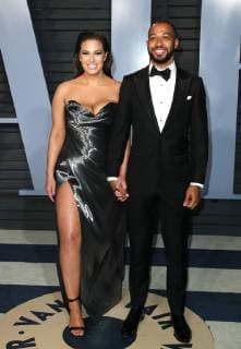 Model Ashley Graham and Justin Ervin arriving at the Vanity Fair Oscar Party in Beverly Hills, California - March 4, 2018 - Vanity Fair Oscar Party 2018, Beverly Hills California United States Wallis Annenberg Center for the  Copyright: xXx h_00497091