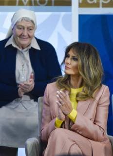 United States First Lady Melania Trump applauds during the 2018 International Courage Awards at the State Department in Washington, DC on March 23, 2018. Behind the First Lady is award recipient, Sister Maria Elena Berini of Italy.  WAP20180323908