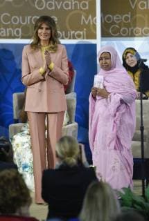 United States First Lady Melania Trump presents a 2018 International Women of Courage Award to L Malouma Said of Mauritania during an Award Ceremony at the State Department in Washington, DC, March 23, 2018.  WAP20180323920 LEIGHxVOGEL