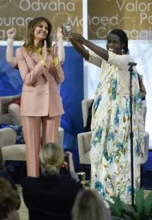 United States First Lady Melania Trump presents a 2018 International Women of Courage Award to Godelieve Mukasarasi of Rwanda for her work in promoting the rights of women and girls affected by sexual violence in conflict zones worldwide during an Award Ceremony at the State Department in Washington, DC, March 23, 2018.  WAP20180323921 LEIGHxVOGEL