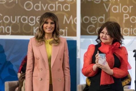 March 23, 2018 - Washington, DC, United States - (L-R): U.S. First Lady Melania Trump, and Aiman Umarova of Kazakhstan, co-founder of the Ã¢â‚¬oeHuman Rights LawyersÃ¢â‚¬Â Public Foundation, pose with her award at the annual International Women of Courage (IWOC) Awards at the U.S. Dept. of State, on Friday, March 23, 2018. Washington United States  - ZUMAn230 20180323_zaa_n230_698 Copyright: xCherissxMayx