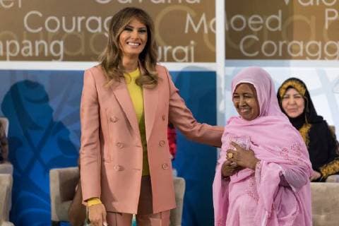 March 23, 2018 - Washington, DC, United States - (L-R): U.S. First Lady Melania Trump, and LÃ¢â‚¬â ¢Malouma Said, former slave now deputy (Member of Parliament) to the Mauritanian National Assembly, pose with her award at the annual International Women of Courage (IWOC) Awards at the U.S. Dept. of State, on Friday, March 23, 2018. Washington United States  - ZUMAn230 20180323_zaa_n230_709 Copyright: xCherissxMayx