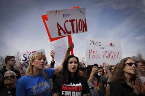 March 24, 2018 - Albuquerque, New Mexico, U.S - CHRISTINA LARSON (CQ), left in blue, and her fourteen year old daughter JADE LARSON (CQ), in black t-shirt, both of Albuquerque, N.M. attend a rally with thousands of people at Tiguex Park in Albuquerque during the March For Our Lives rally in Albuquerque, New Mexico Saturday March 24, 2018. Albuquerque U.S. - ZUMAv88_ 20180324_zap_v88_017 Copyright: xPatxVasquez-Cunninghamx
