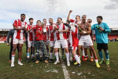 The winning team, Midland Air Ambulance, celebrate their victory after the Celebrity Charity Football Match hosted by Sellebrity Soccer for the Benjamin Lewis Charity Cub at the Abbey Business Stadium, Cheltenham, England on 25 March 2018. Copyright: xDavidxHornx PMI-1918