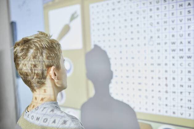 Student in class at interactive whiteboard model released Symbolfoto property released  ZEDF01199