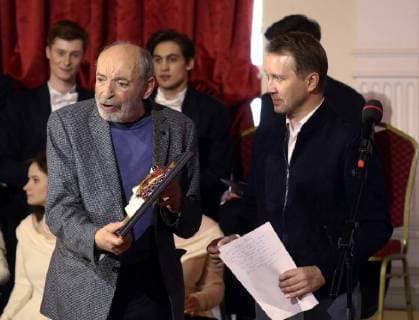 MOSCOW, RUSSIA â€“ MARCH 27, 2018: Actor Valentin Gaft (L) receives a special 2018 Golden Mask award in the Outstanding contribution to the theatrical arts category from actor Yevgeny Mironov (R), during a ceremony at the Bolshoi Theatre. Vyacheslav Prokofyev TASS  TS079925