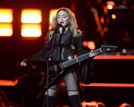 January 24, 2016 - Miami, Florida, United States Of America - MIAMI, FL - JANUARY 24: Madonna looked tired, sluggish and at times intoxicated as she delivered a lack luster performance which apparently included lip syncing during parts of her Miami performance. Perhaps the pressure of her Custody Battle with Guy Ritchie where her son refuses to live with her is getting to her. Madonna here is seen performing on stage during her Rebel Heart Tour at AmericanAirlines Arena. As reported earlier this week Madonna was vigorously denying that she had been drunk on stage during two recent performances, tequila brand Jose Cuervo was boasting that the superstar had been knocking back tequila shots on January 24, 2016 in Miami, Florida....People: Madonna..T Miami United States Of America - ZUMAr160 20160124_zaa_r160_120 Copyright: xSMGx